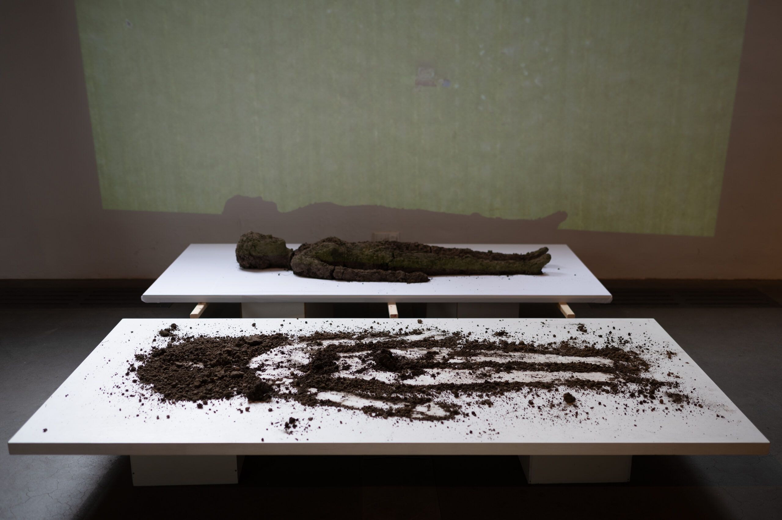 ritual art performance with sculpture made of clay polluted with PFAS, 